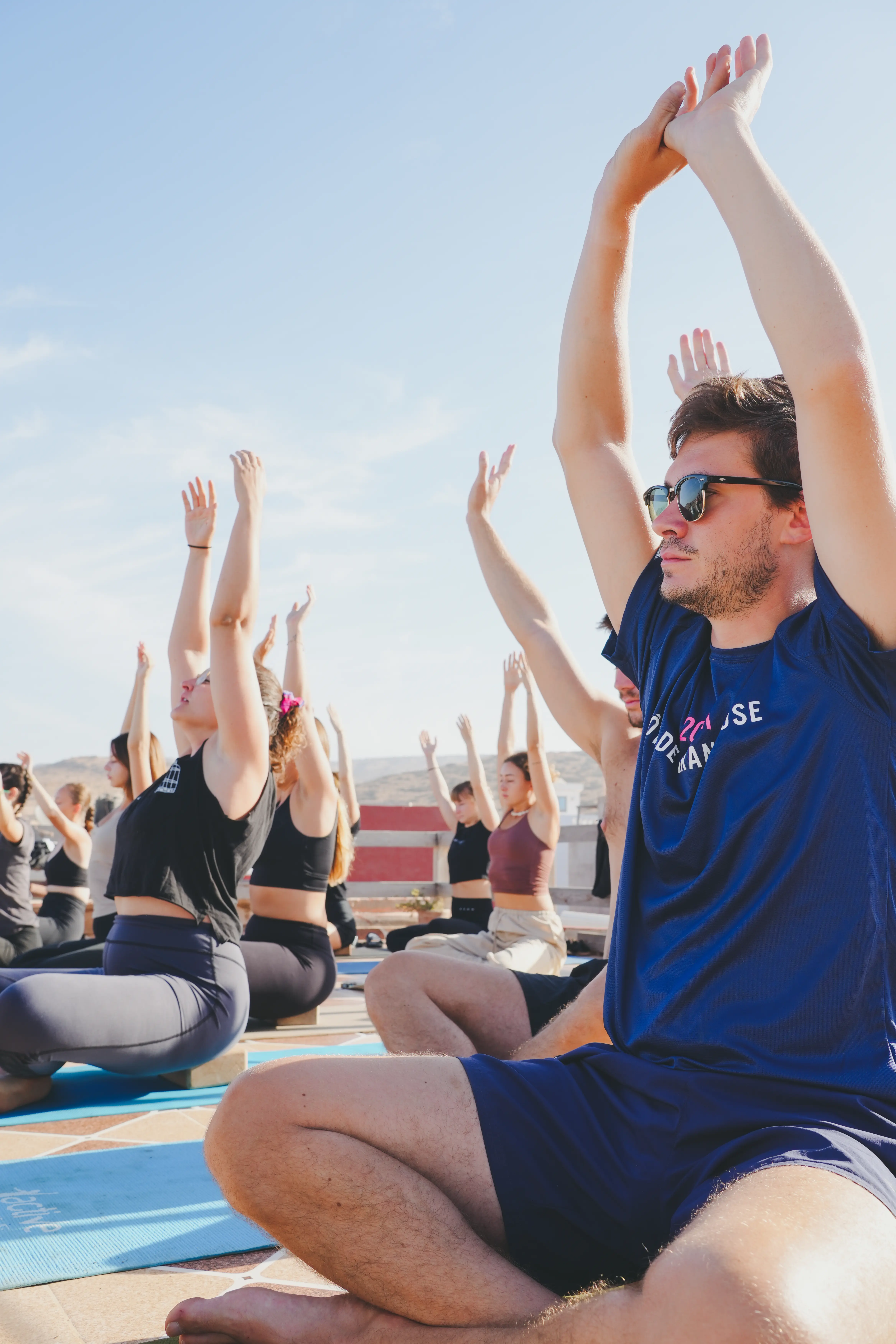 Sunset rooftop oceanview yoga session